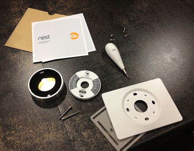 All the things that come with your Nest. The Nest itself, the wallplates, instructions and screwdriver