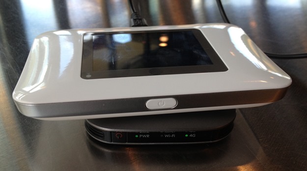 The AT&T Unite LTE Hotspot sitting on a Clear Hotspot. The Unite is much larger